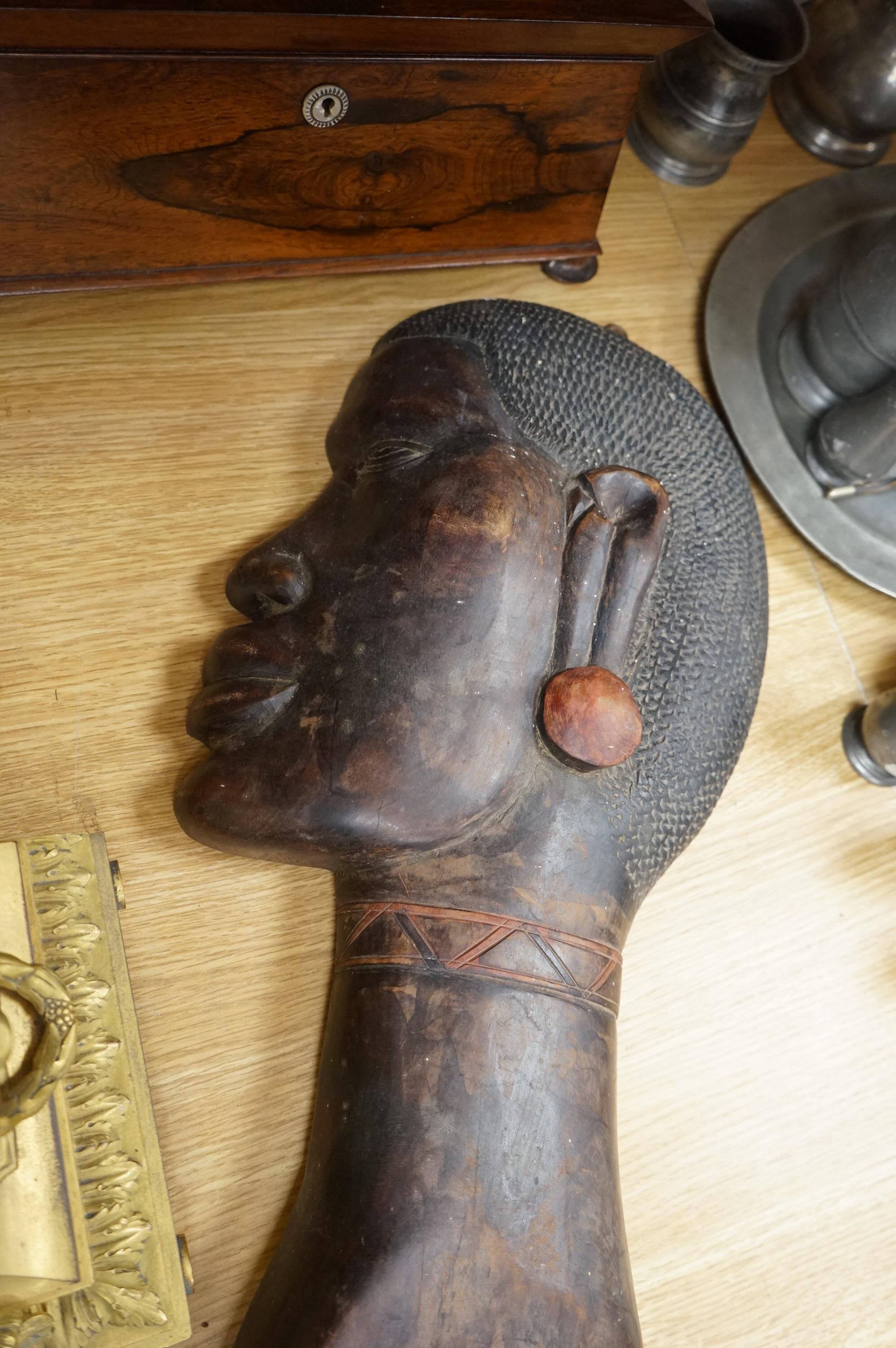 A carved African tribal hardwood wall plaque, 64cm high